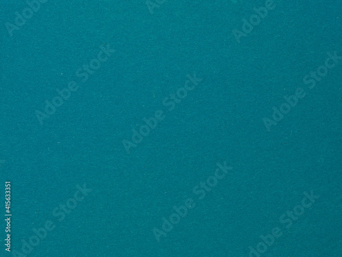 Recycled paper texture background in turquoise green vintage color