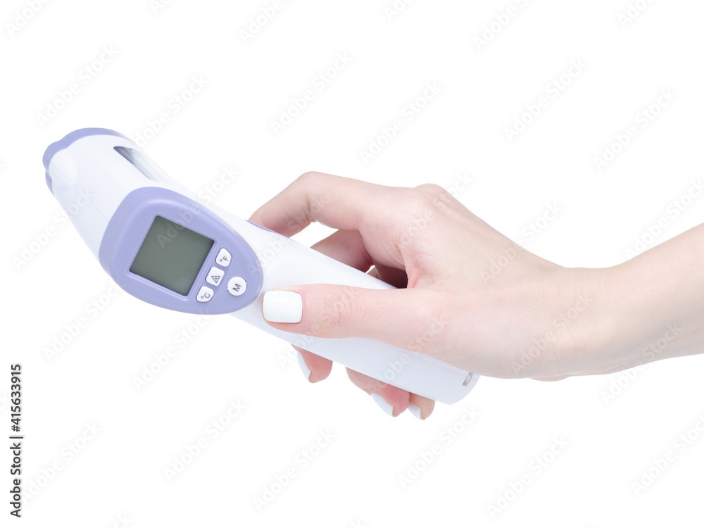 electric infrared non-contact thermometer in hand on white background isolation electric infrared non-contact thermometer in hand on white background isolation