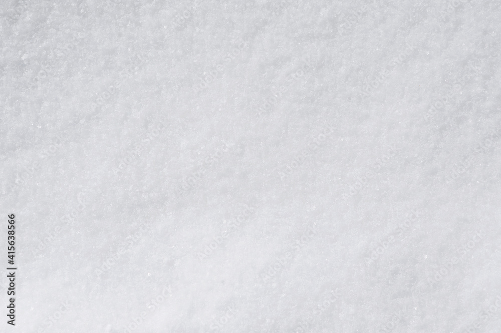 Background, texture of winter white fresh snow. Photo, top view.