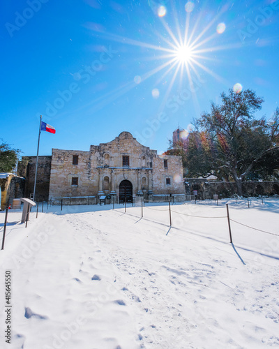 Texas Snow Winter freezing weather at the Alamo in San Antonio. Inclement weather snow storm blizzard in the south United States. Effects of Climate Change.