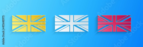 Paper cut Flag of Great Britain icon isolated on blue background. UK flag sign. Official United Kingdom flag sign. British symbol. Paper art style. Vector.