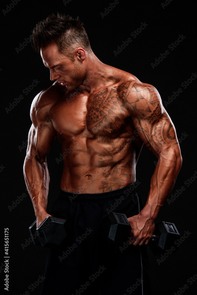 Bodybuilder Execising With Weights. Studio Shot of Muscular Men Lifting Weights