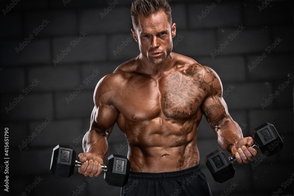 Bodybuilder Execising With Weights. Studio Shot of Muscular Men Lifting Weights