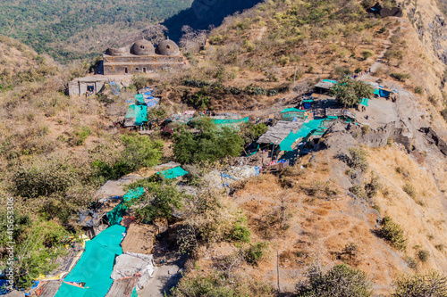 Makai Kothar building and stalls along the path to Pavagadh hill, Gujarat state, India photo