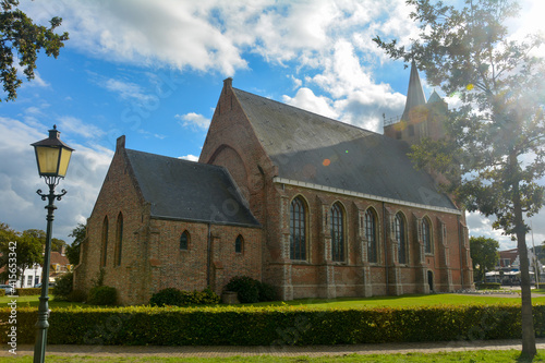 Sint Jacobus Church in Renesse, Zeeland, Netherlands in sunshine photo