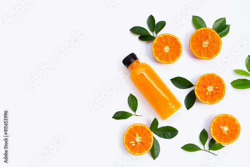 High vitamin C, Juicy and sweet. Fresh orange fruit with bottle of orange juice on white background.