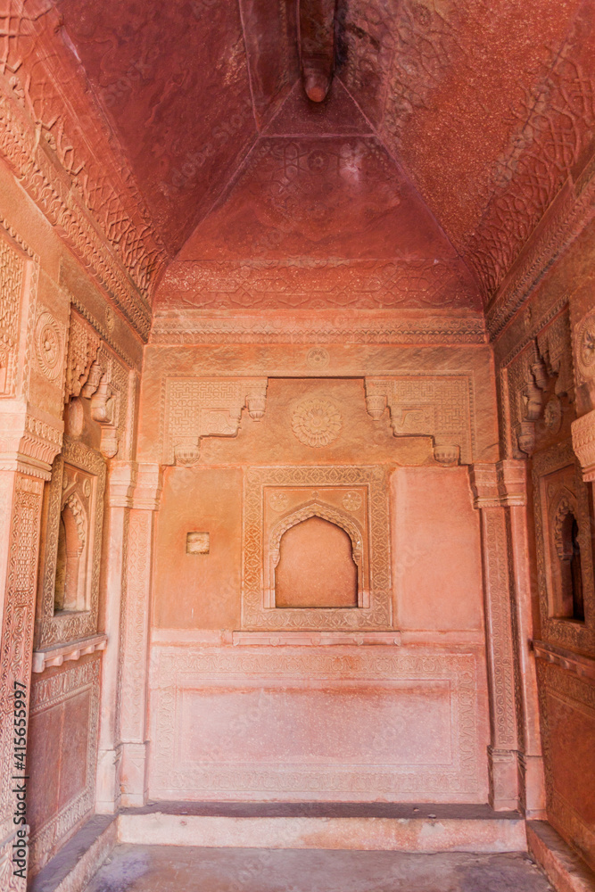 FATEHPUR SIKRI, INDIA - FEBRUARY 17, 2017: Room in Birbal Palace in the ancient city Fatehpur Sikri, Uttar Pradesh state, India FATEHPUR SIKRI, INDIA - FEBRUARY 17, 2017: Room in Birbal Palace in the ancient city Fatehpur Sikri, Uttar Pradesh state, India