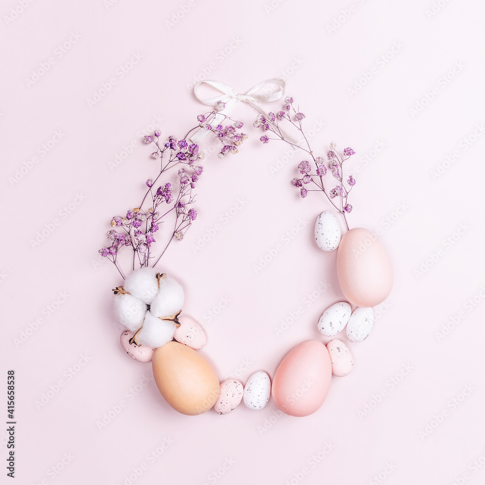 Creative flat lay photo of easter eggs on colorful background.