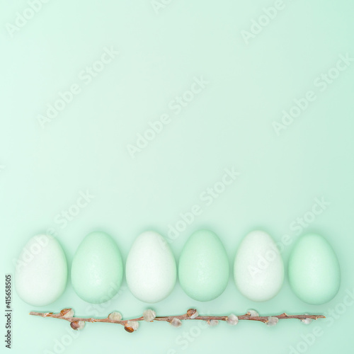 Creative flat lay photo of easter eggs on colorful background. photo