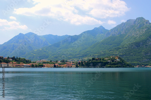 Lake Como in Italy. Lombardy. The azure water of the lake. In the background, the town of Lecco at the foot of the Alps 