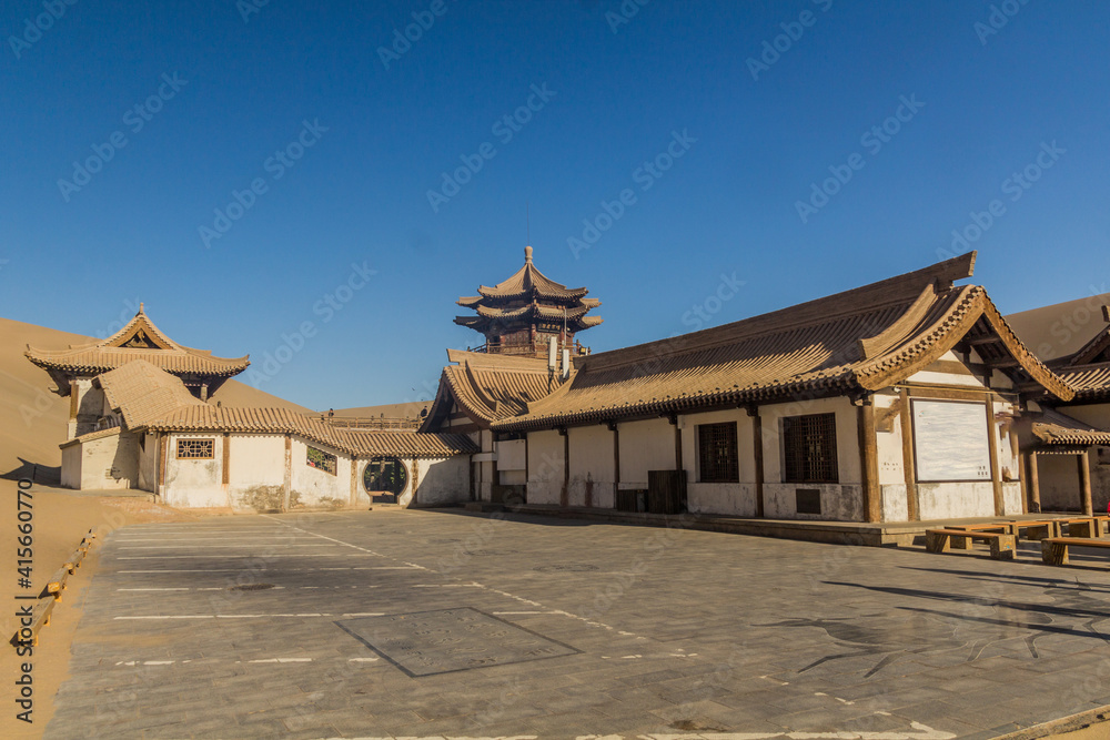 Pavilion at Crescent Moon Lake at Singing Sands Dune near Dunhuang, Gansu Province, China Pavilion at Crescent Moon Lake at Singing Sands Dune near Dunhuang, Gansu Province, China