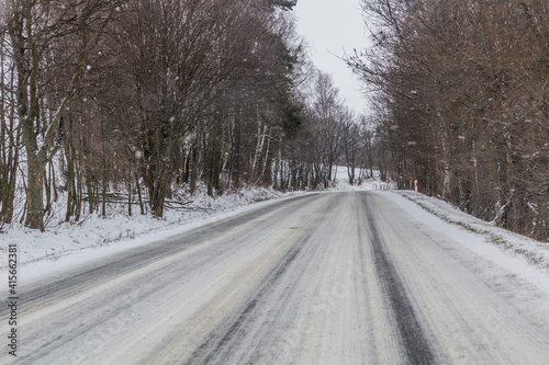 Winter view of I/11 road near Suchy vrch mountain, Czech Republic © Matyas Rehak