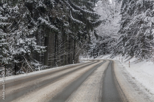 Winter view of I/11 road near Suchy vrch mountain, Czech Republic