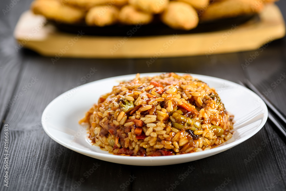 rice with vegetables in sweet and sour sauce