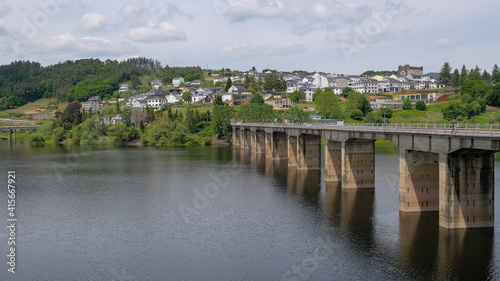 Landscape view of famous bridge and historical town in Portomarin on Santiago Way route,spain galicia