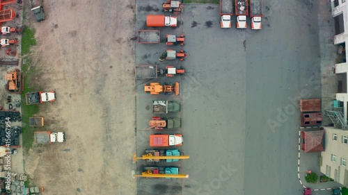 Special equipment, tractors, trucks are parked, top view photo