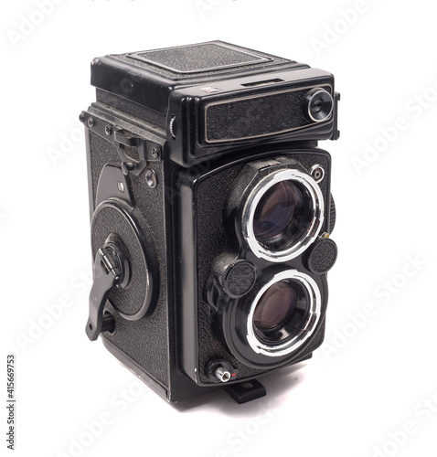 Old medium format 6x6 camera on a white background. photo