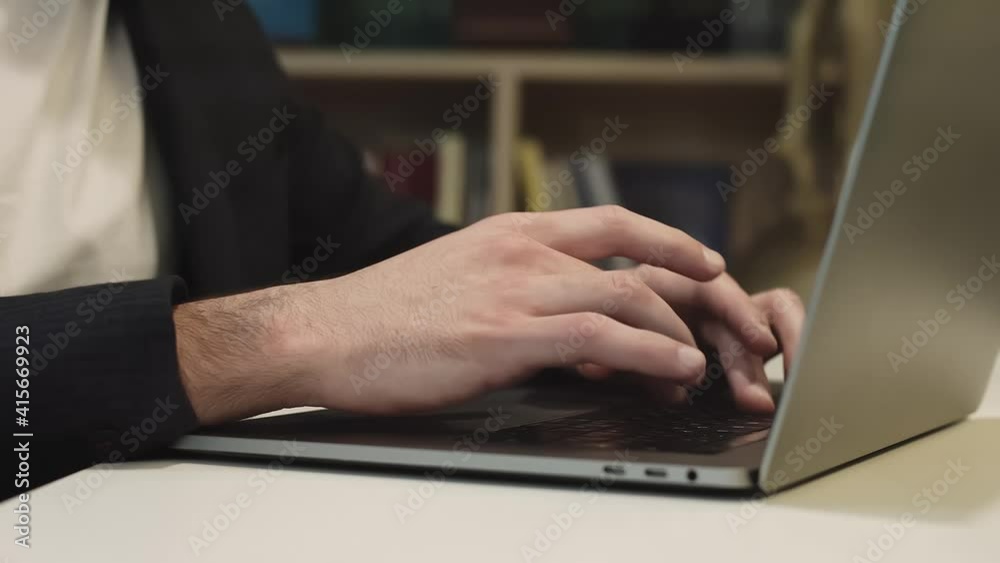 Close-up of the keyboard. Businessman working on a laptop. 