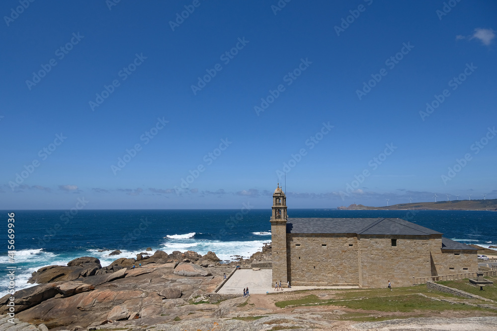 Wide view of Lady of Barca sanctuary church on Muxia Galicia sea coast,camino de Santiago landmarks