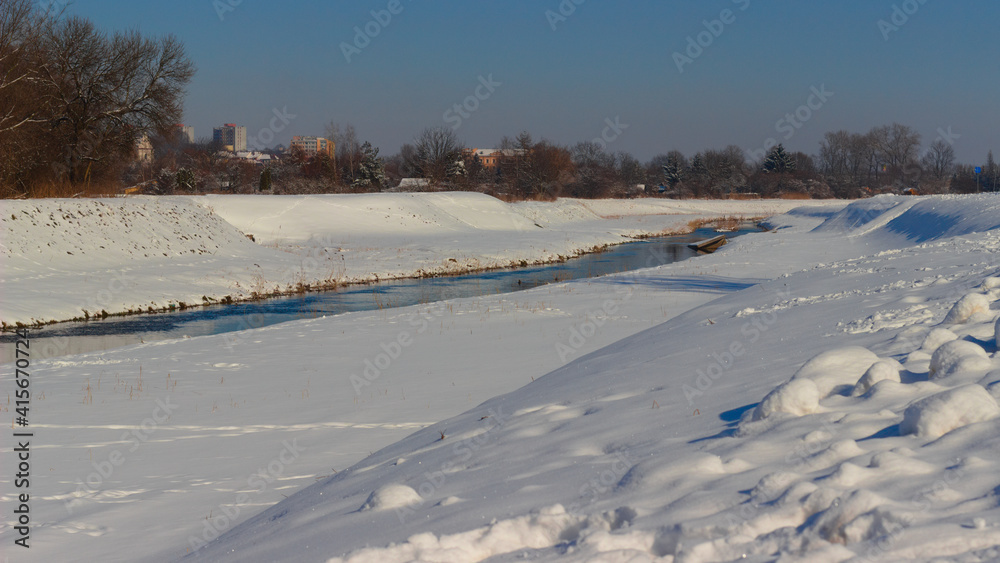 Landscape with the river in winter.