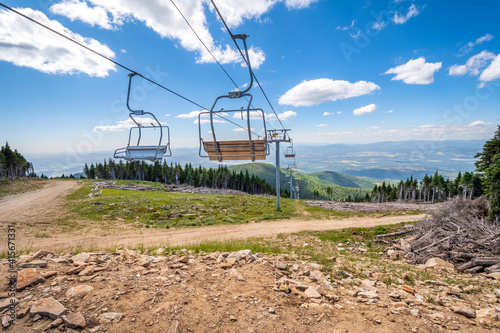 Empty ski lifts at a closed ski resort at summer on Mount Spokane state park in Spokane County, Washington, USA