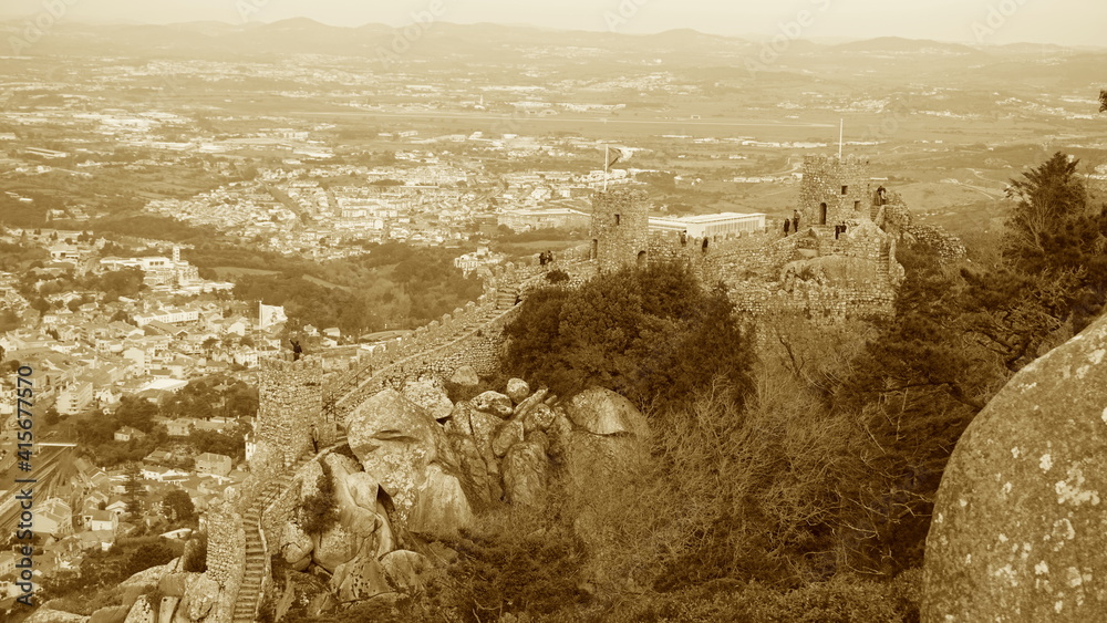 Obraz premium Lisbon, Portugal - The Castle of Sintra, popularly known as Castelo dos Mouros, is located in the village of Sintra, parish of São Pedro de Penaferrim, municipality of Sintra, in the district Lisbon