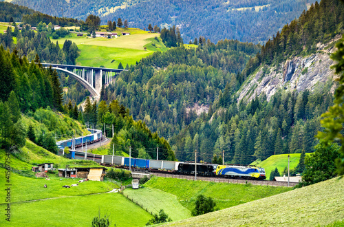 Trailers crossing the Alps by rail at the Brenner Pass in Austria photo