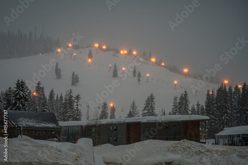 2021-02-14 SNOQUALMIE PASS SKI RESORT AT DAWN WITH LIGHTS ON photo