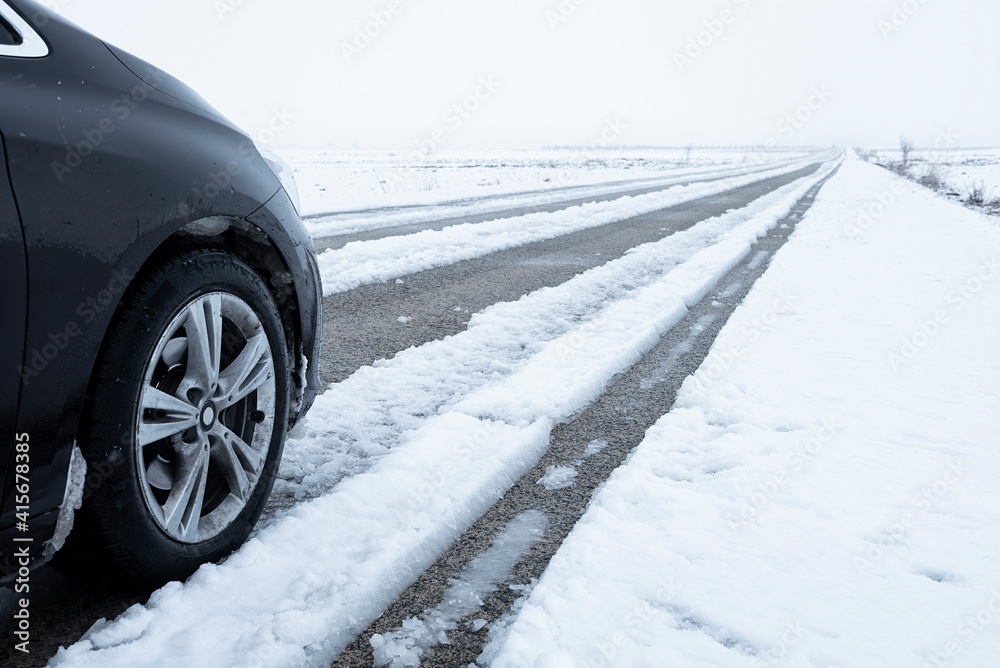 Albacete, Spain; 2021-01-08; Wheel marks on snow and car. Albacete, Spain; 2021-01-08; Wheel marks on snow and car.