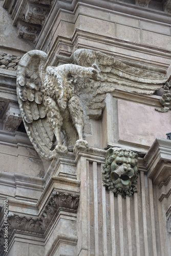 Carved stone gargoyles at the Iglesia de la Compania, Quito, Ecuador photo