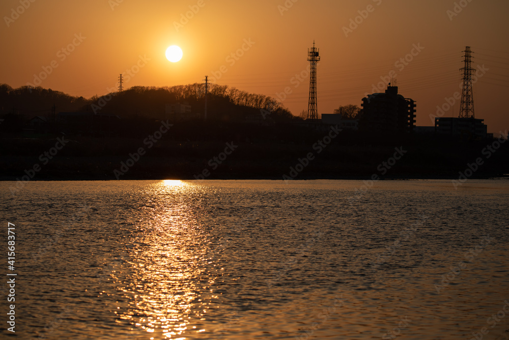 夕陽と夕焼け空と送電線