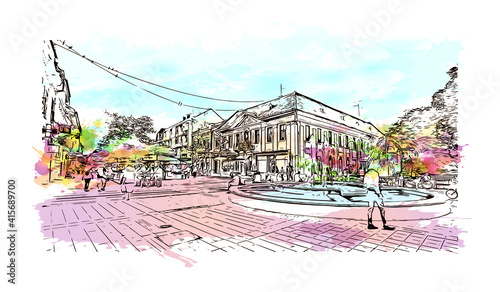 Building view with landmark of Sombor is the
city in Serbia. Watercolour splash with hand drawn sketch illustration in vector.