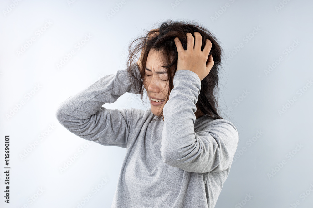 An Asian woman in bad shape