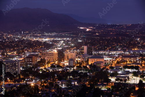 Aerial nighttime skyline view of Downtown Riverside  California  USA.