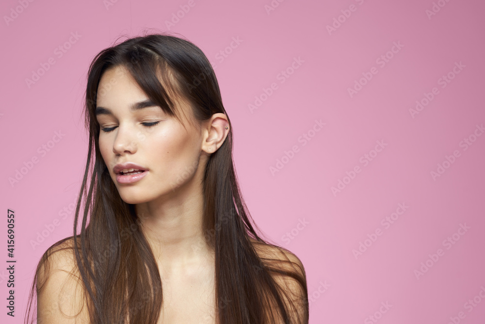 brunette bare shoulders clear skin body care pink background brunette bare shoulders clear skin body care pink background