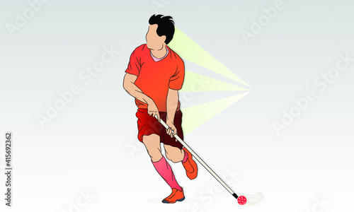 A player with a stick and a ball runs. Floorball game
