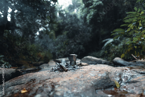 outdoor moka pot ,Brewing coffee in the forest with a moka pot