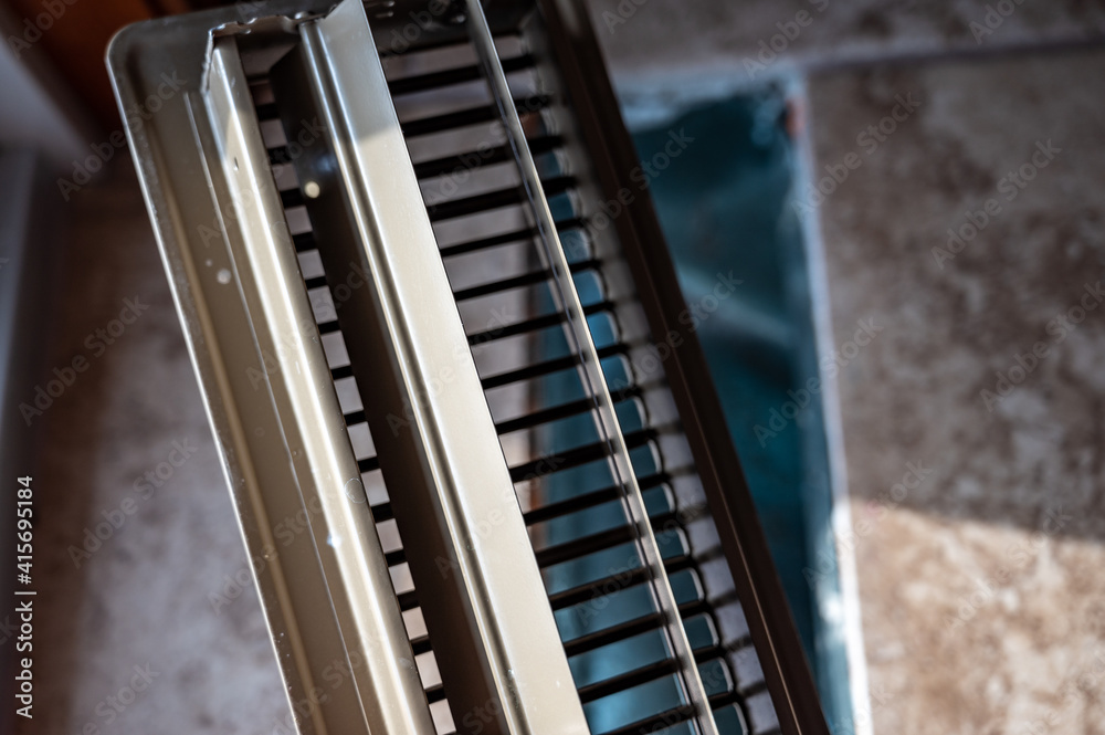 tiled open floor vent with cover removed