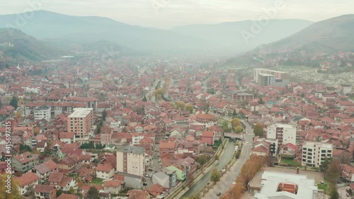 Panorama Of Red Roofscape In The Serbian City Of Novi Pazar, Region Of Sandzak. - Aerial Wide Shot photo