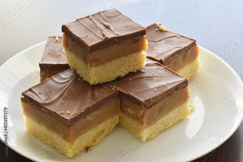 Millionaire s shortbread  caramel shortcake  or millionaire s slice. Copy space is on the right side.