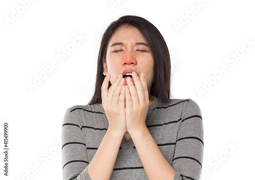 young asian woman sneeze feel sick.