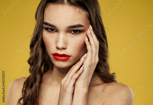 Portrait of nude woman red lips eye shadow model