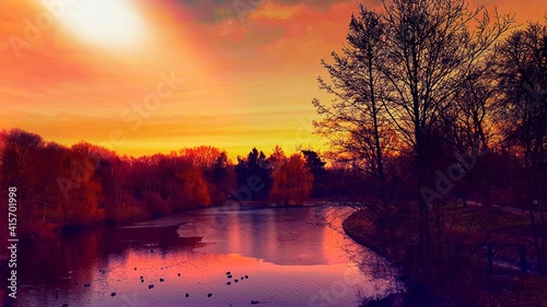 Colorful sunset over the frozen river