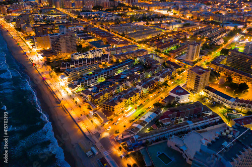 Scenic night aerial view of Spanish tourist town of Oropesa del Mar on Mediterranean coast, Valencian Community