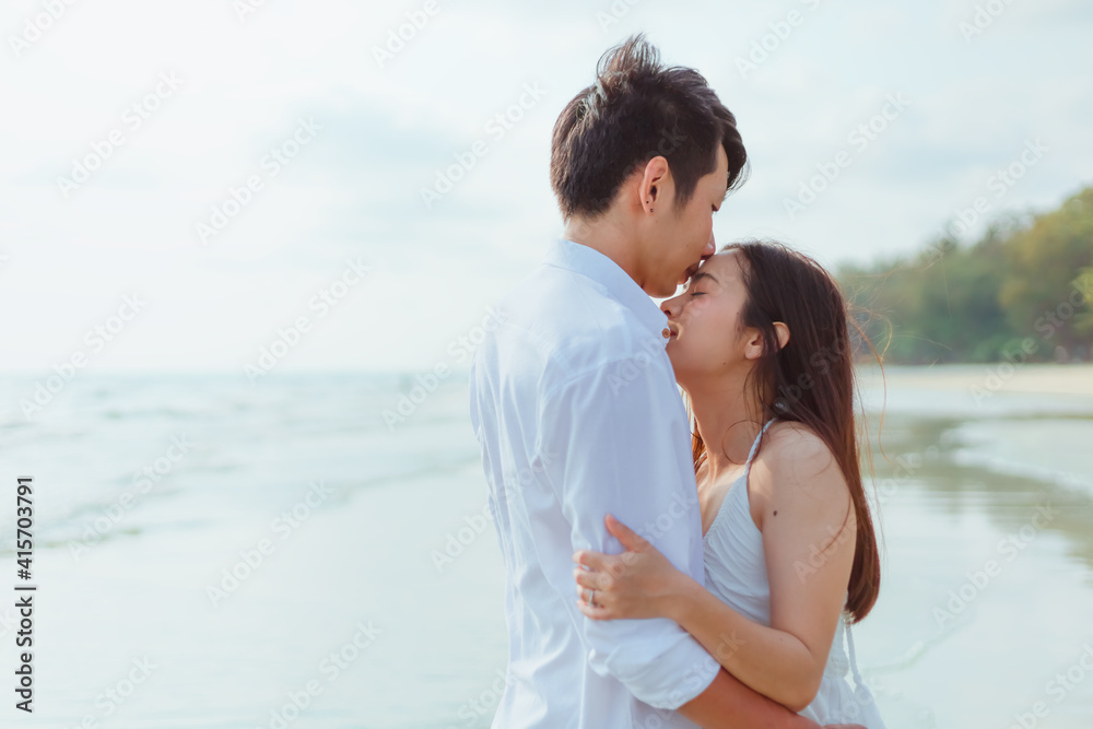 romantic time loving couple kissing on the beach. Love travel concept. romantic time loving couple kissing on the beach. Love travel concept.
