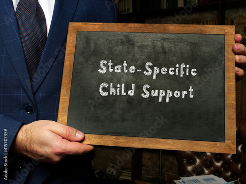 Financial concept meaning State-Specific Child Support with inscription on chalkboard.