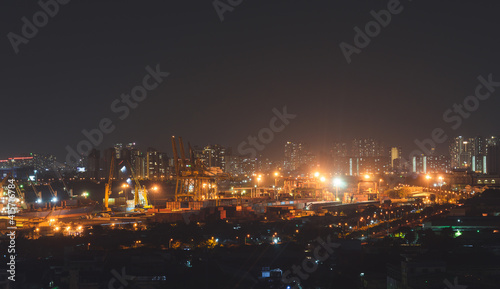 Aerial panoramic cityscape view of Ho Chi Minh city and the River Saigon  Vietnam with beautiful lights at night. Financial and business centers in developed Vietnam