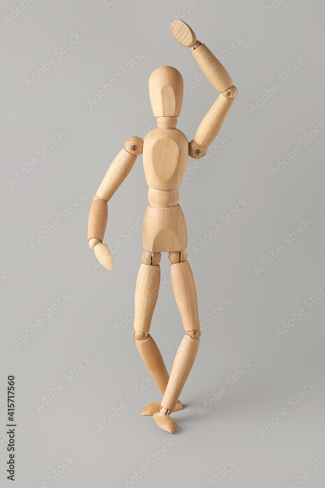 Wooden mannequin on light background Wooden mannequin on light background