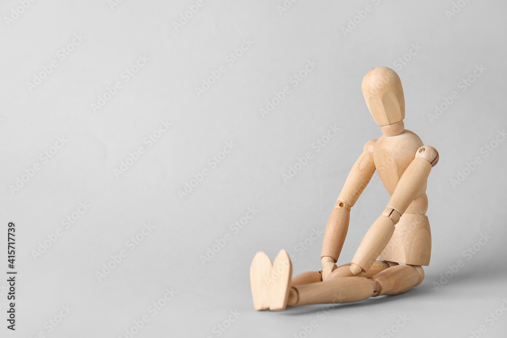 Wooden mannequin on light background Wooden mannequin on light background