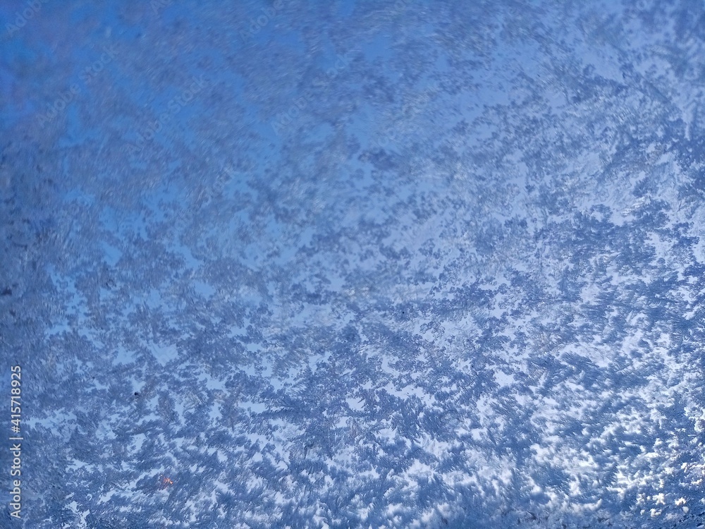 Snow and ice on the glass of the car. Snow and ice on the glass of the car.
